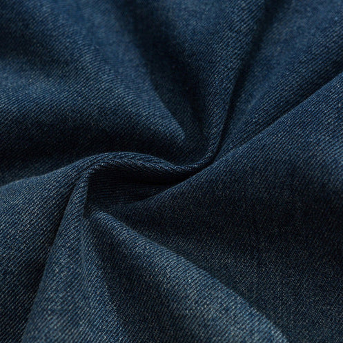 Close-up of blue fabric with folds