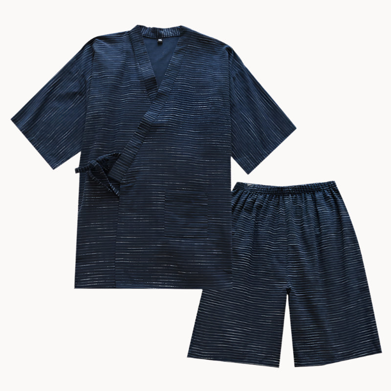 Navy blue pajama set with shirt and shorts on a white background