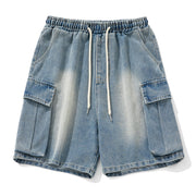 Blue denim shorts with drawstring on a white background