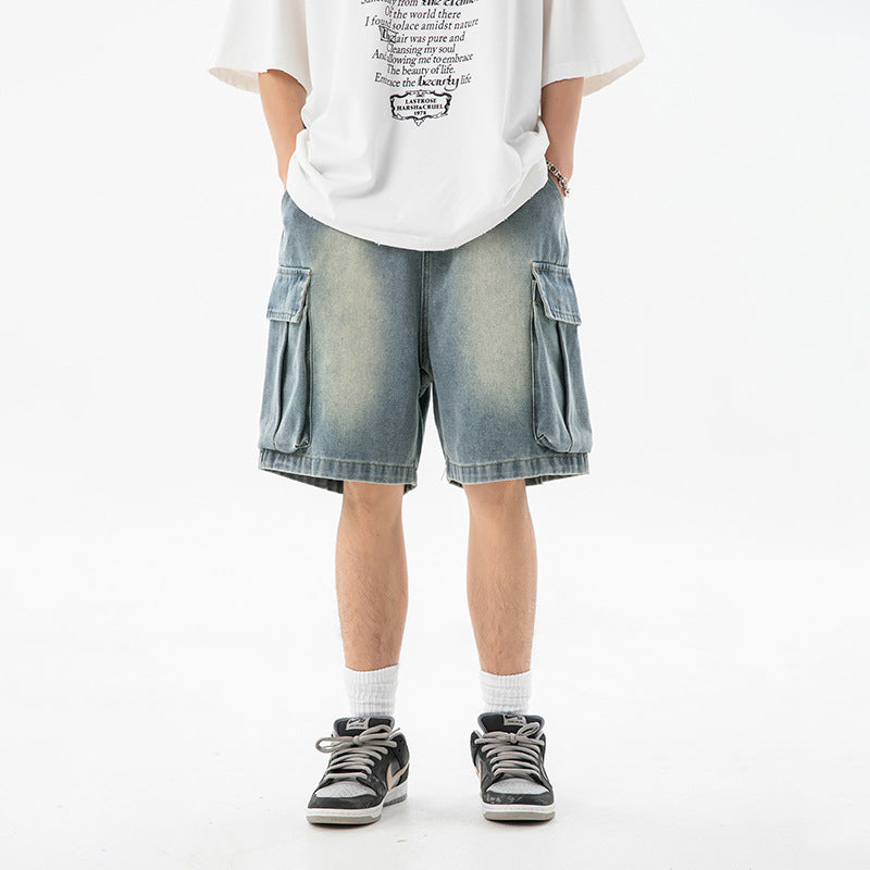 Person wearing light blue cargo shorts and a white t-shirt on a white background
