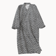 Black and white patterned robe on a white background